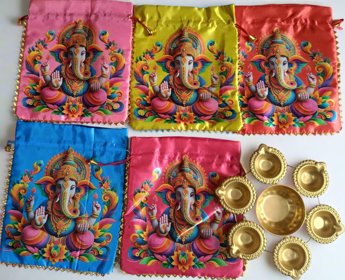 Colorful pouches with Ganesha designs and gold decorative items on a white background